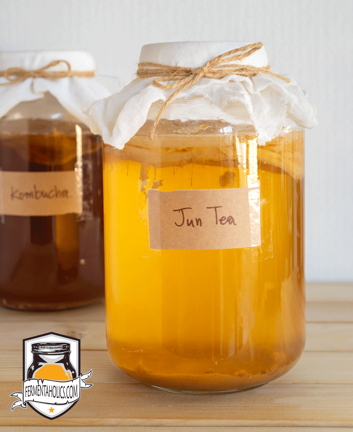 Homemade Jun Kombucha Tea in Gallon Jar Fermenting