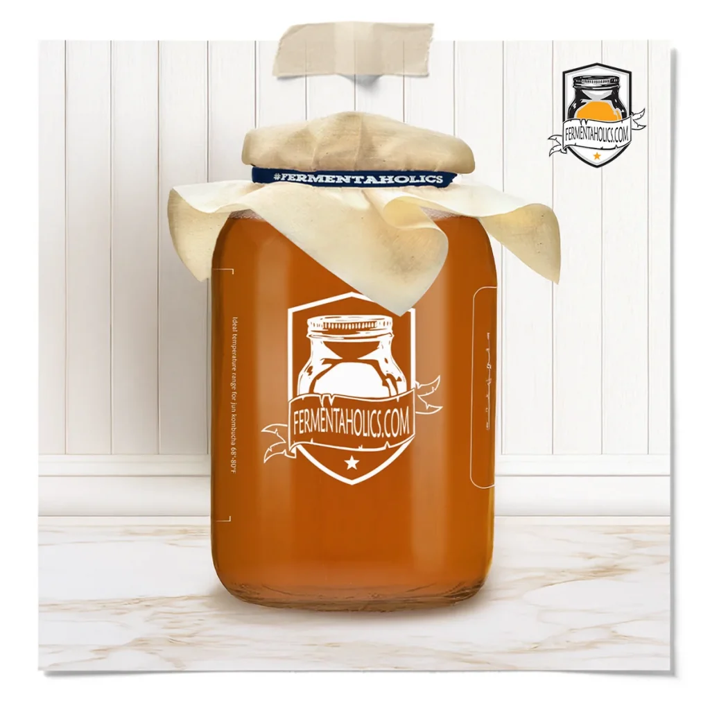 A Fermentaholics Gallon Jar Of Kombucha During First Fermentation